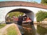 Jannock emerging from a Grand Union lock.