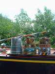 decorated cans on a boat roof