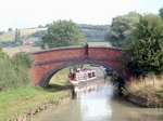 Trad boat firmly aground at next 			lock